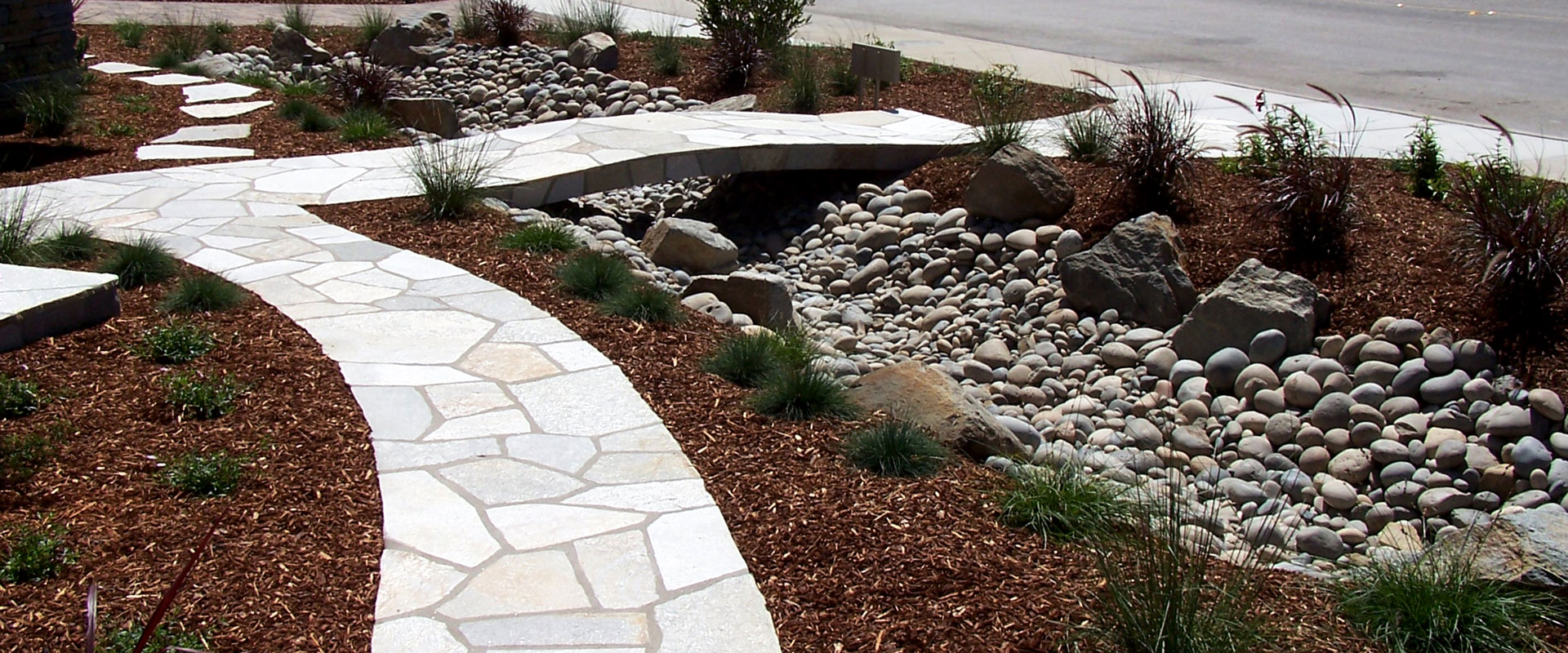 Earthscapes Landscaping Services Dry Creekbed Banner